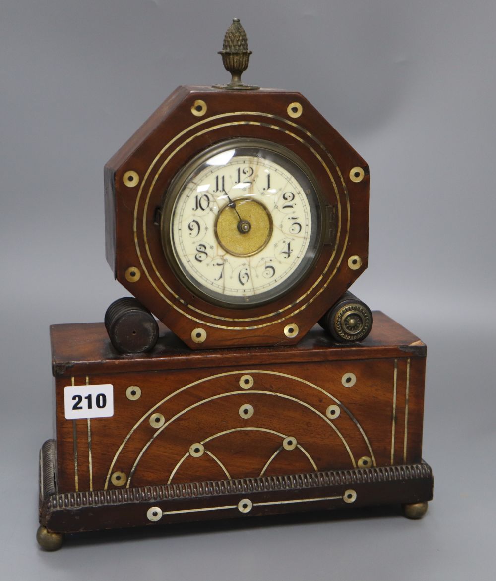 A Regency style mahogany mantel timepiece, with brass and mother of pearl inlay, height 34cm